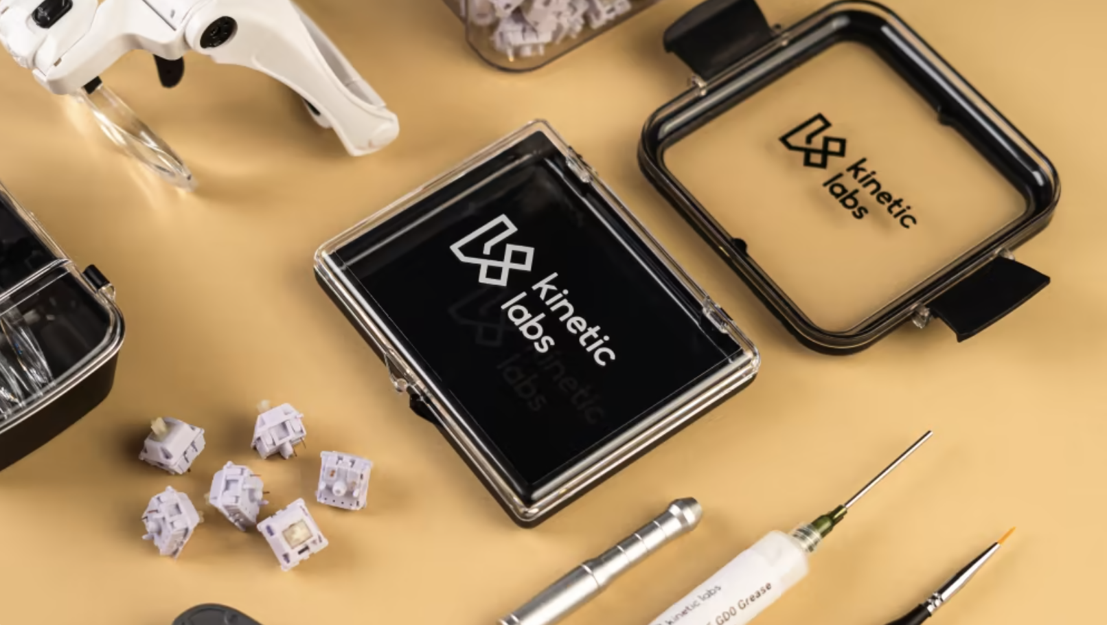 Keyboard building workspace with tools and parts